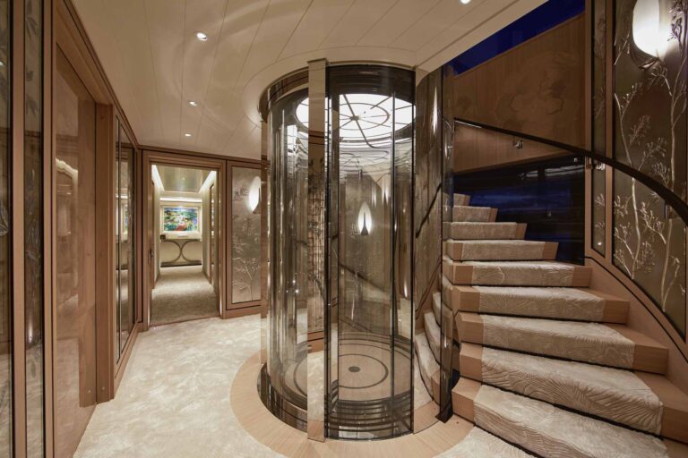 Stairwell With The Glass Elevator