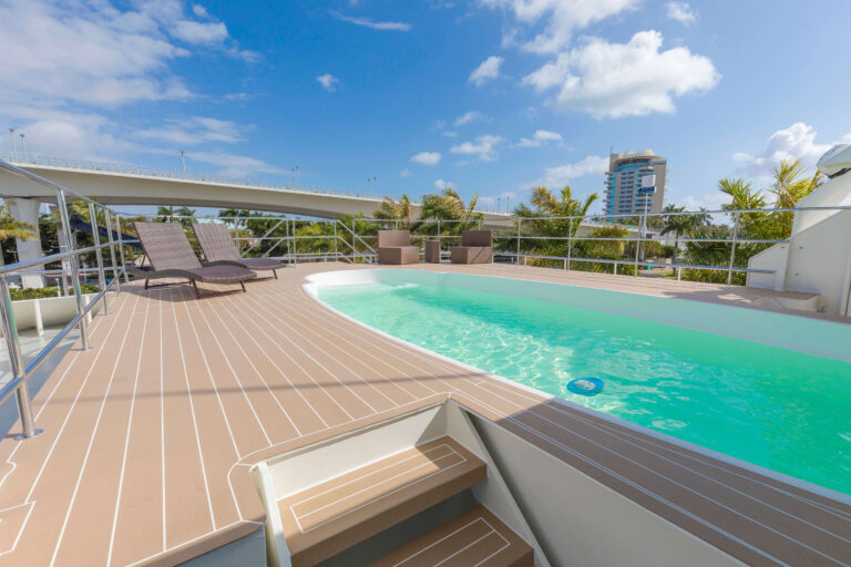 Swimming Pool With Sun Loungers