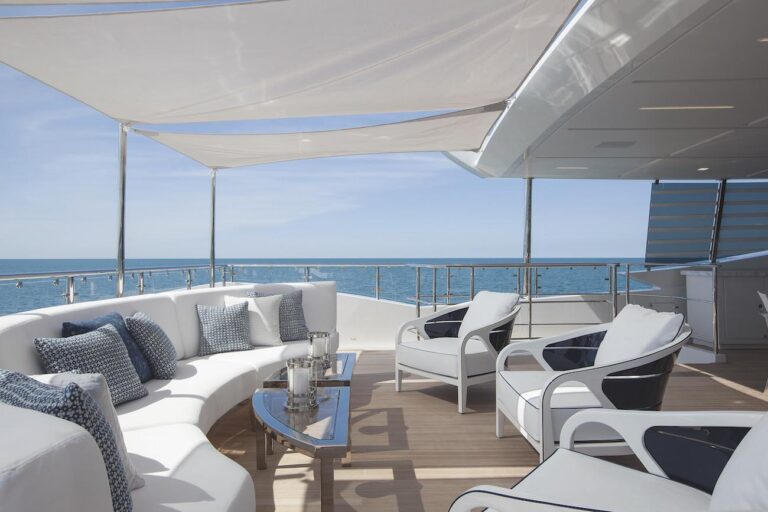 Upper Deck Aft Seating And Coffee Tables On The Outside