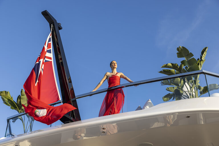 Woman In Red Dress On A Yacht - Lifestyle