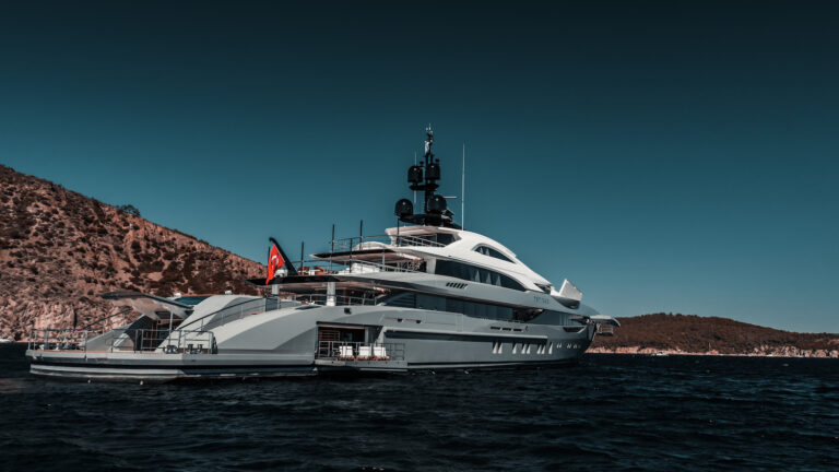 Yacht At Anchor With Open Beach Club