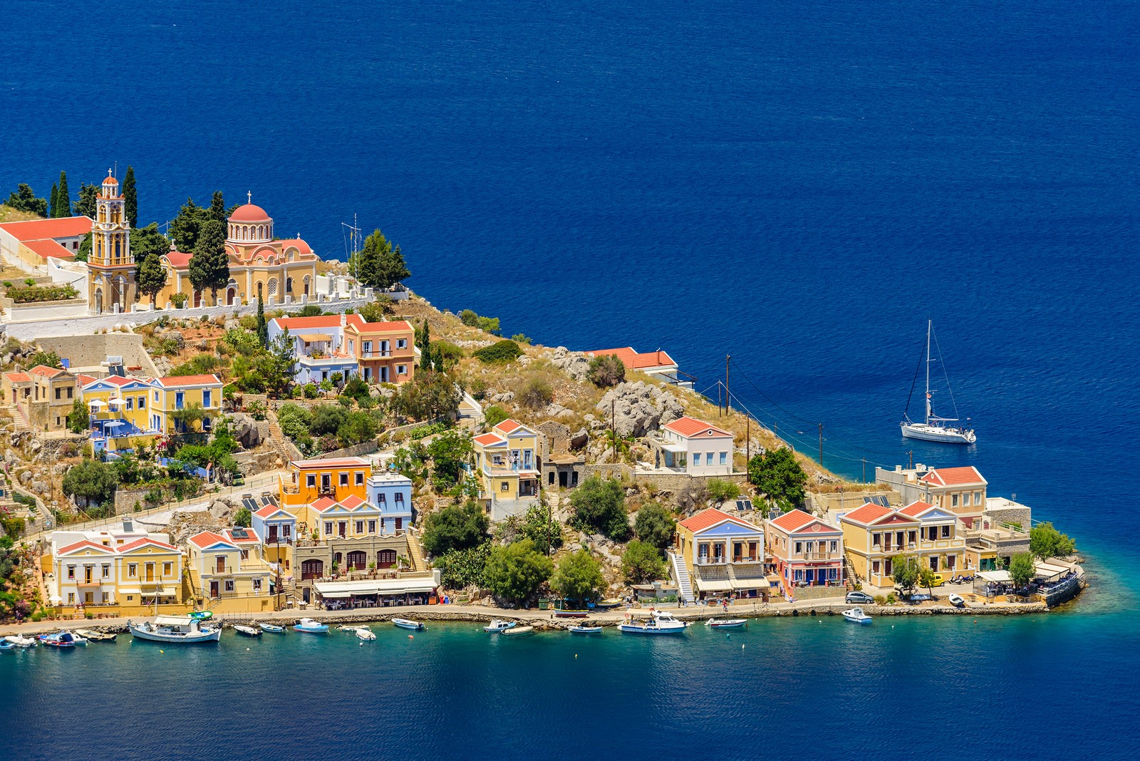 coastline of Symi with beautiful old houses, Symi island, Dodecanese, Greece