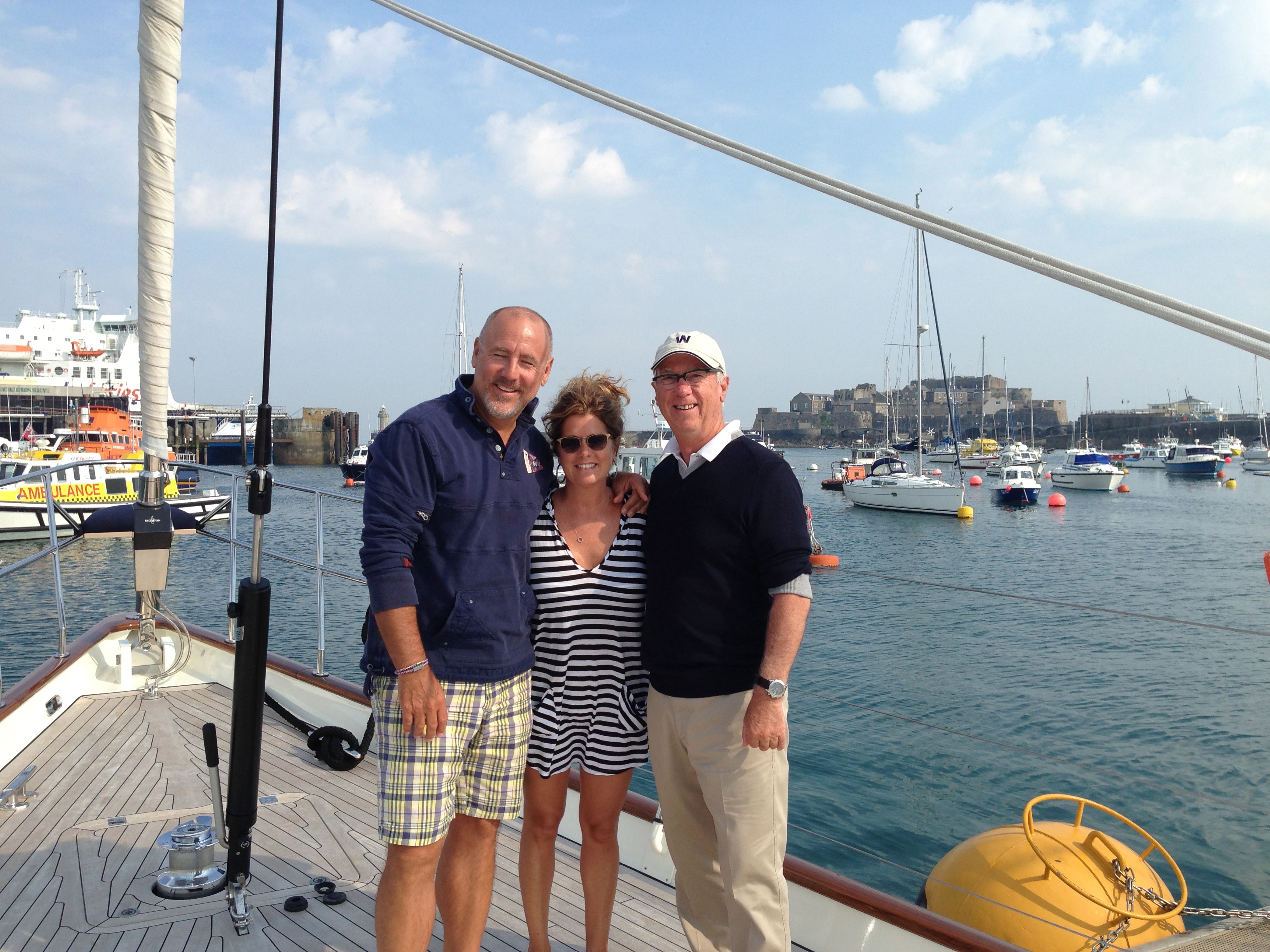 Ron-with-happy-Clients-aboard-Wavelength-Yacht.jpg