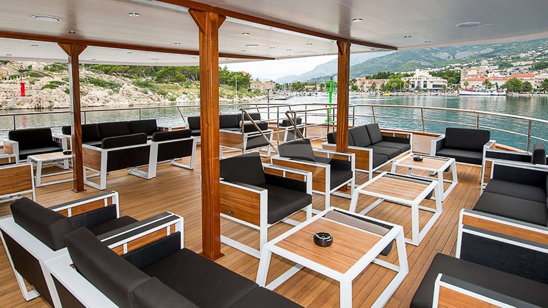 211 Upper deck aft lounge tables and chairs.jpg