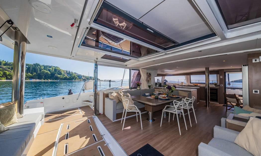 302 Main salon leading onto main deck aft.png