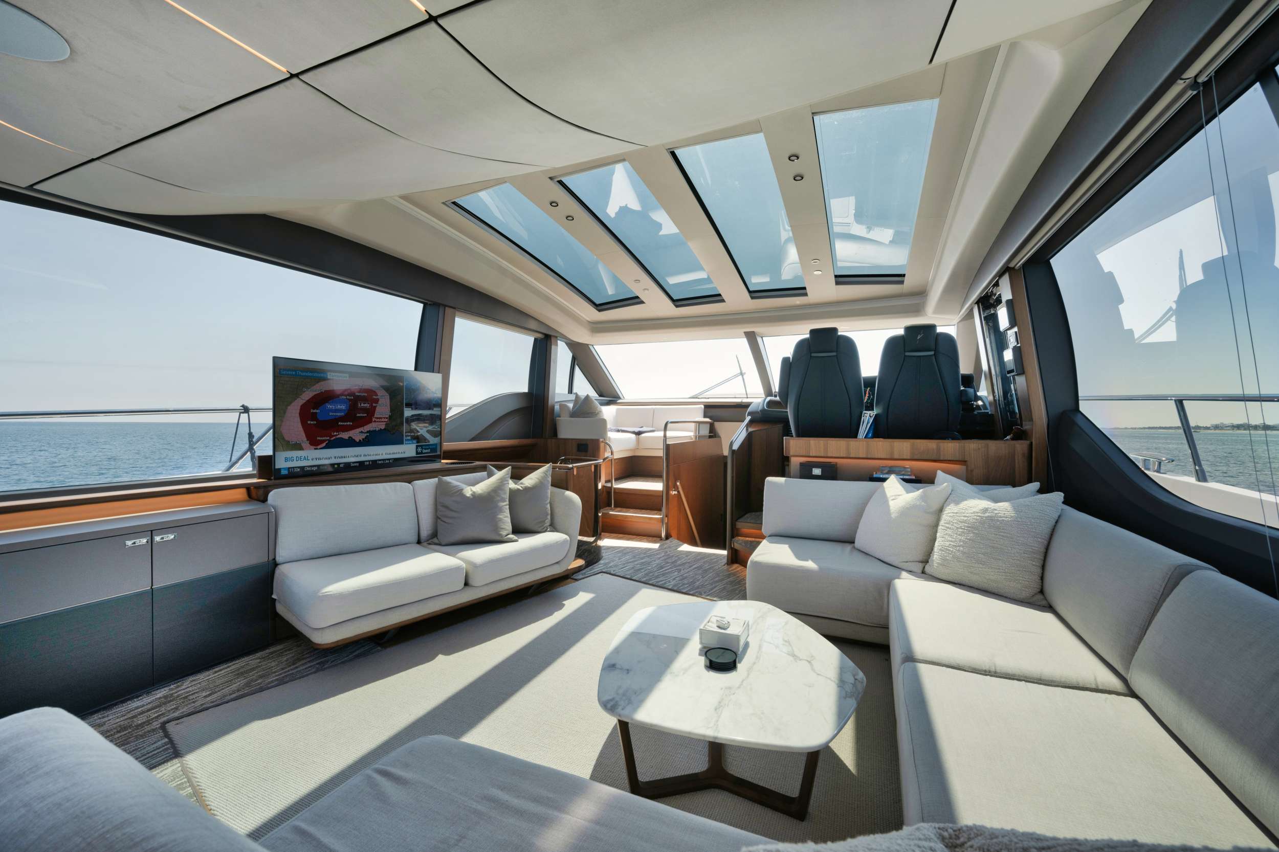 303 Main salon lounge and helm controls.jpg