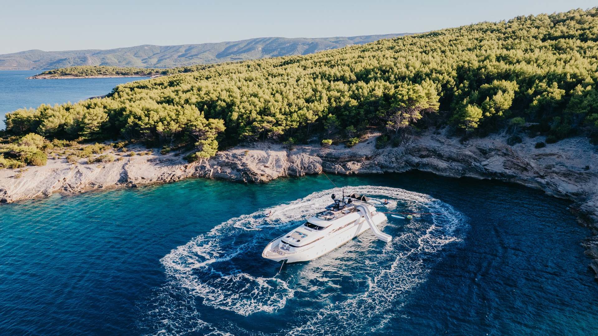 CYNTHIA yacht in a bay.jpg