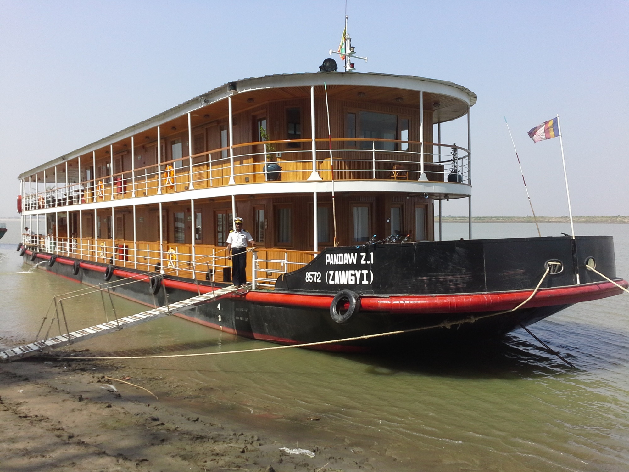 Captain aboard ZAWGYI River Yacht .jpg