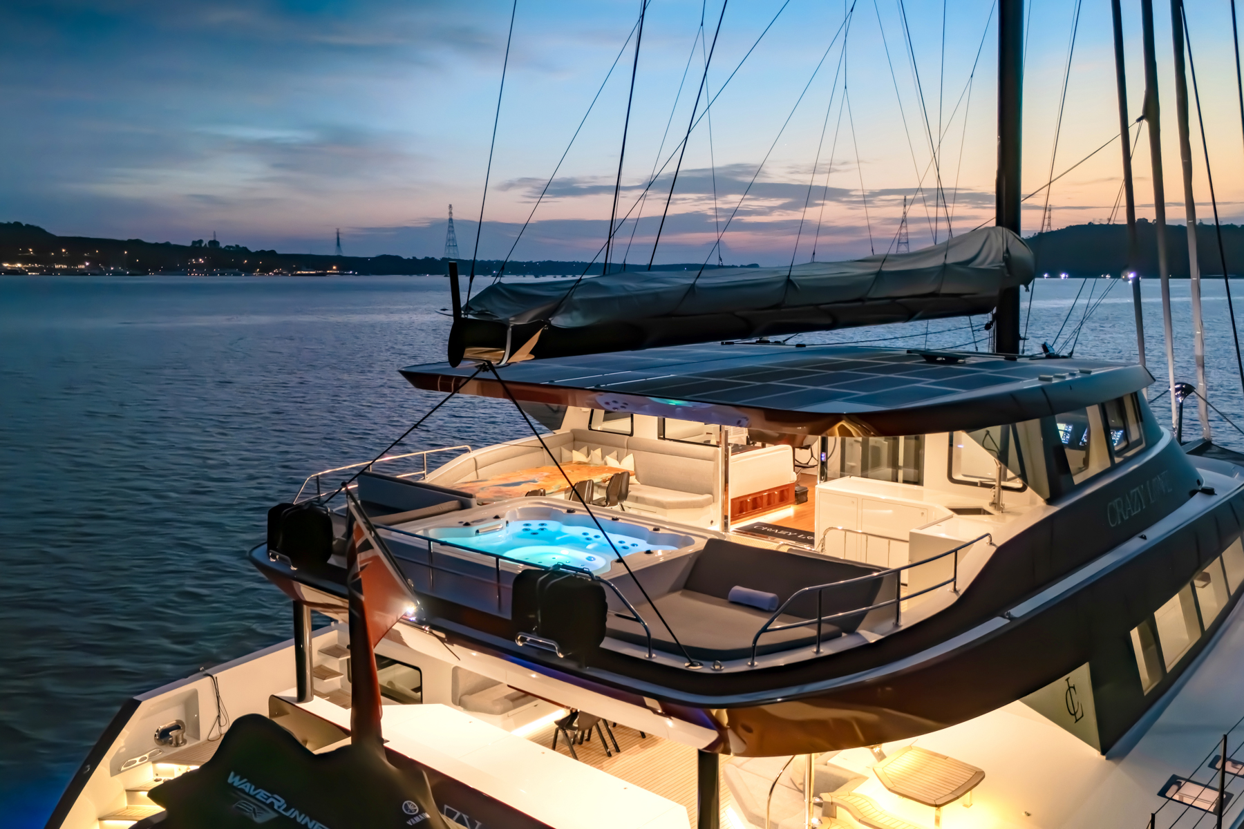 Catamaran CRAZY LOVE decks at night.jpg
