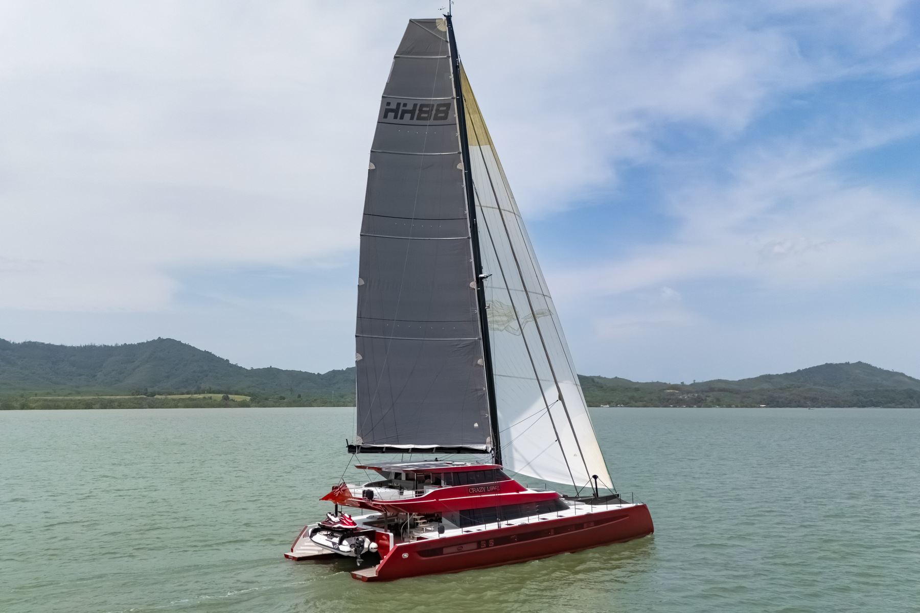 Catamaran CRAZY LOVE sails up.jpg