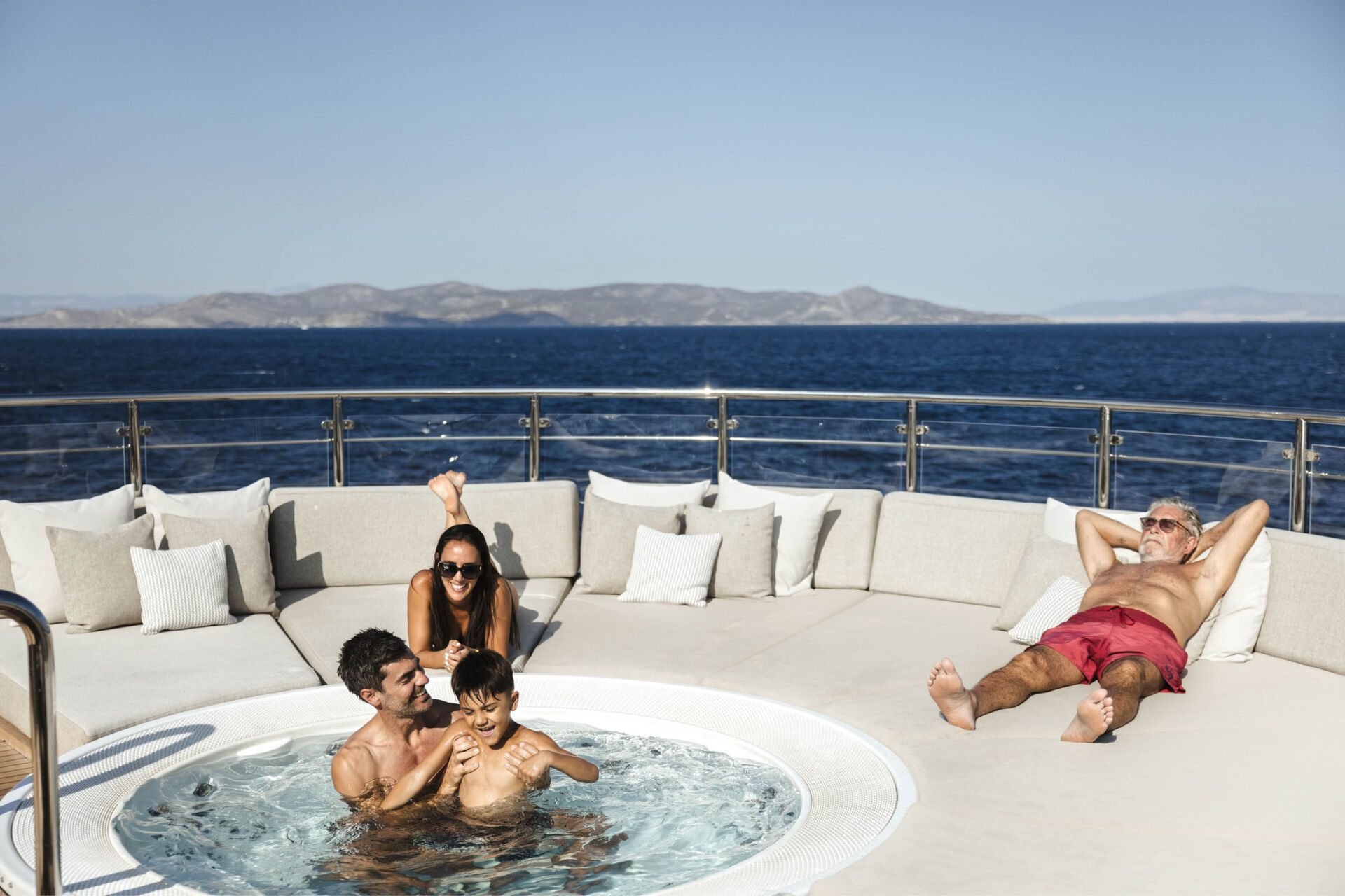 Family fun around a jacuzzi .jpg