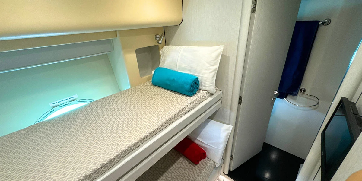 LIGHT-BLUE-Luxury-Charter-Yacht-Sunseeker-Predator-82-Twin-Cabin-View.png