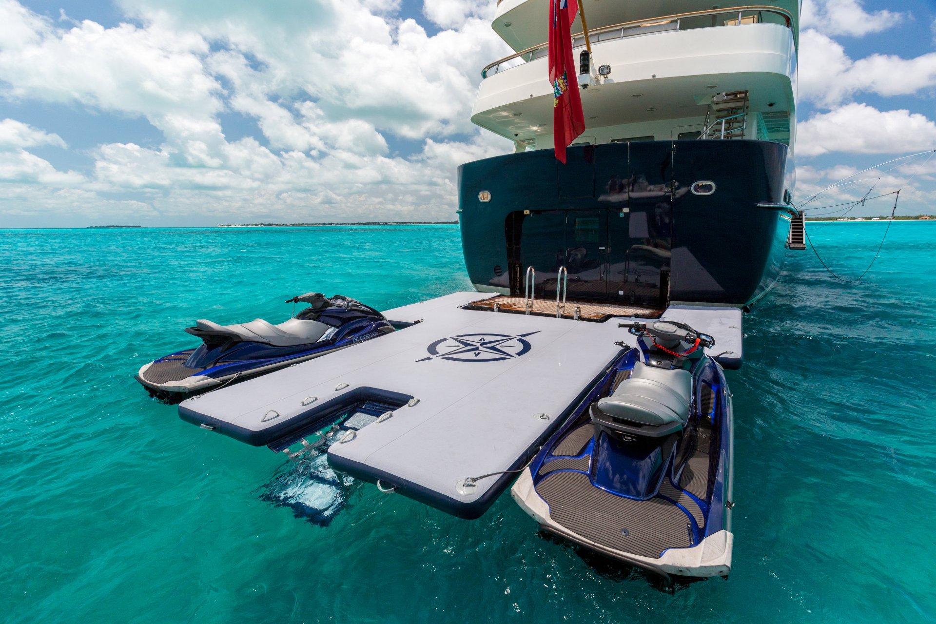 Yacht PIONEER by Palmer Johnson - swim platform with water toys.jpg