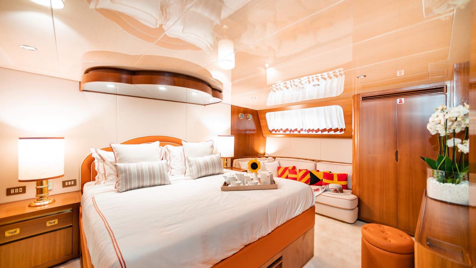 a bedroom with a bed and a desk aboard_yythk.jpg