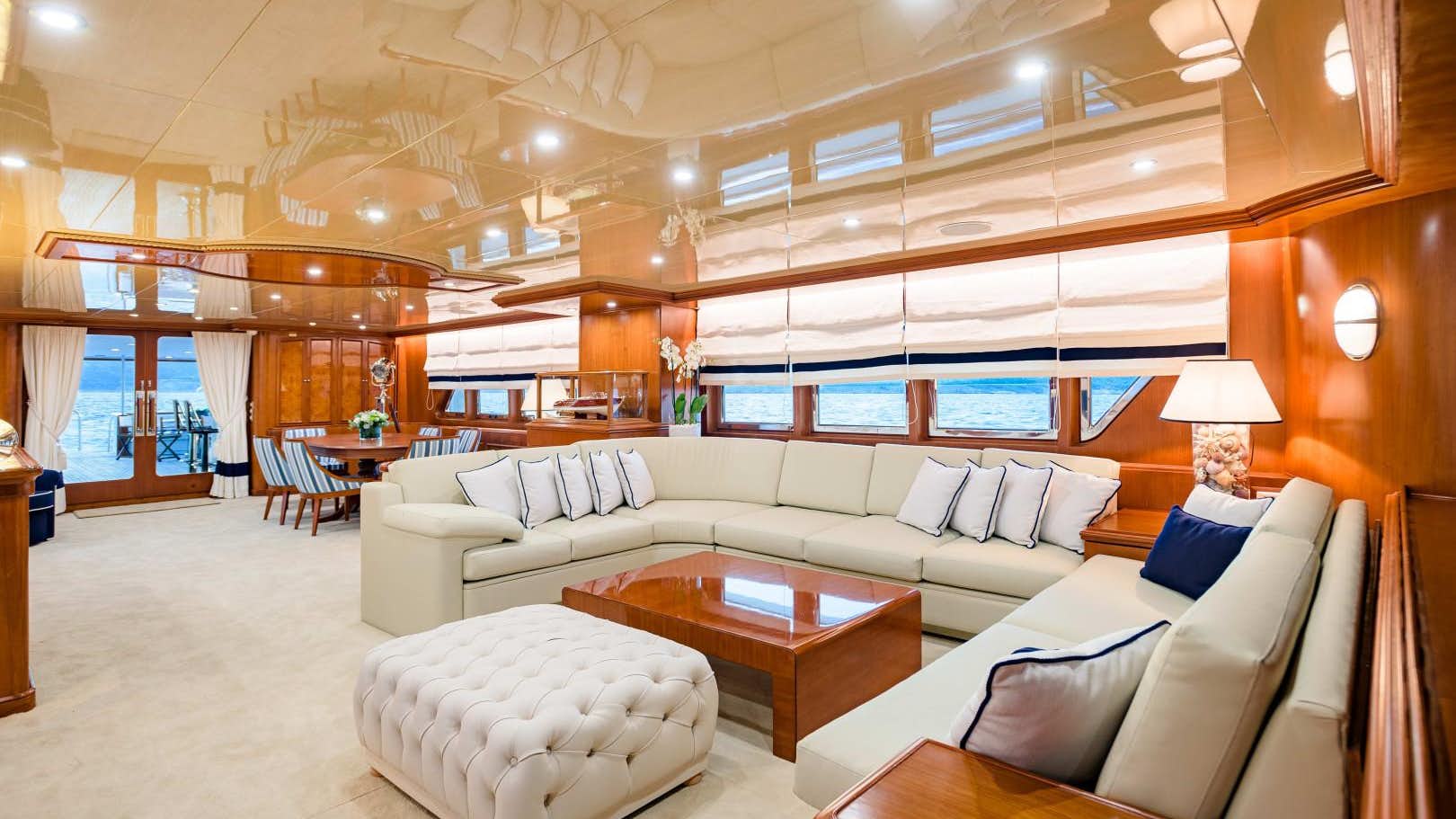 a living room with a large window aboard WIN.jpg