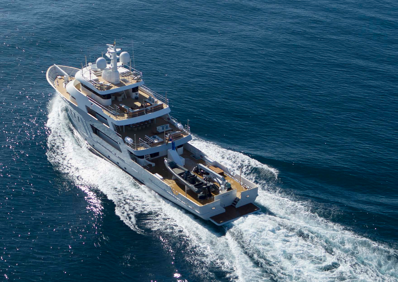aerial fo the yacht running - aft view.png