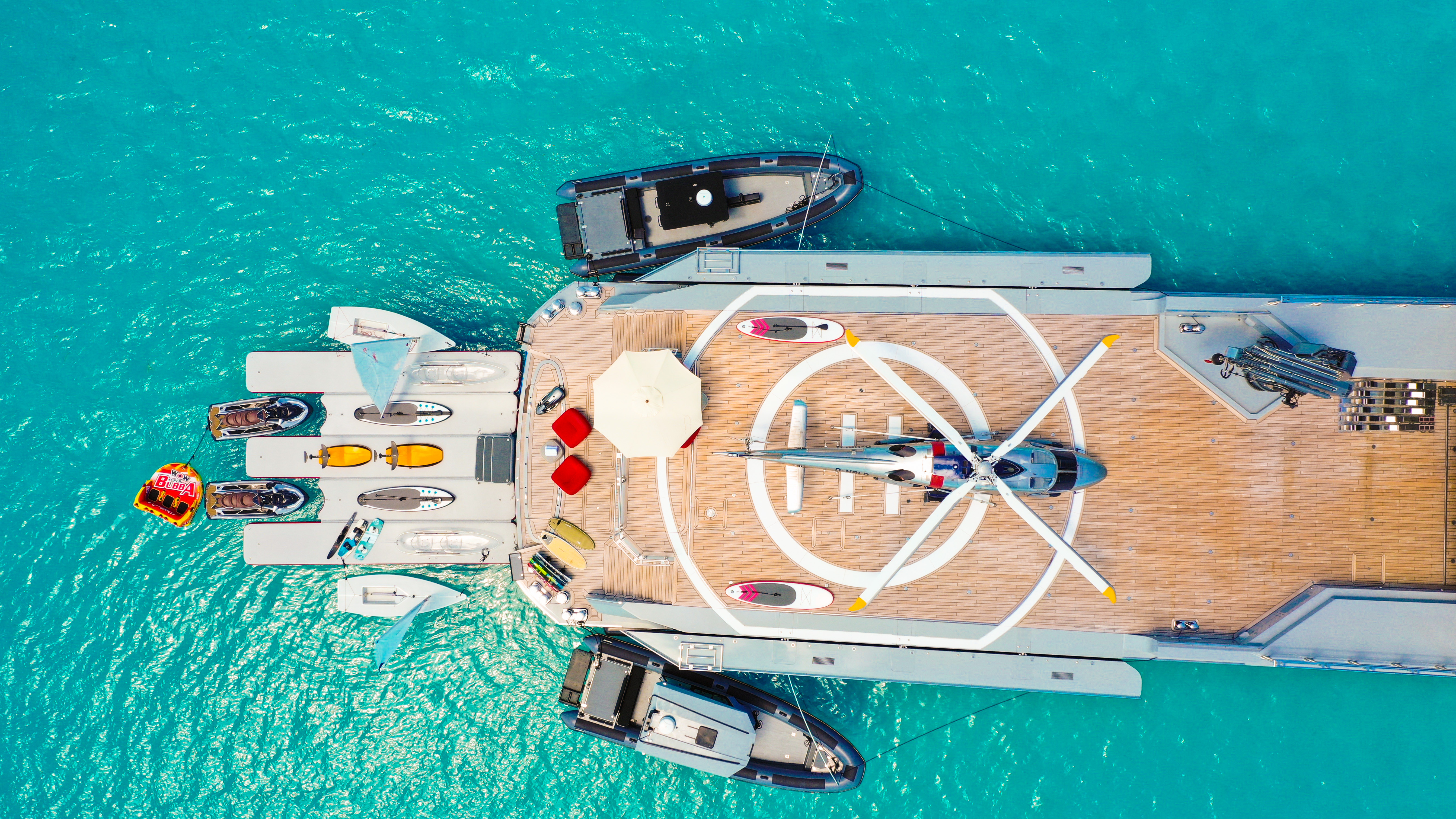 aerial view of the yacht with toys and helicopter.jpg