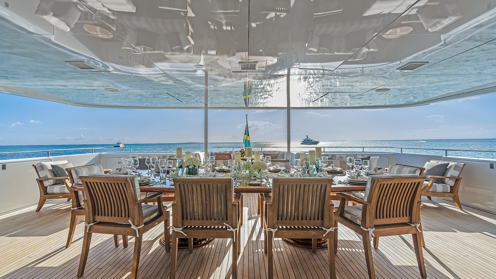 bridgedeck - aft deck dining table set up.jpg