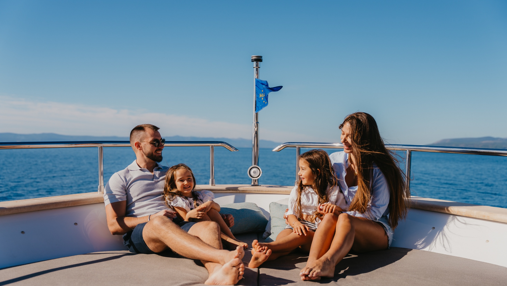 family with children on a yacht .png