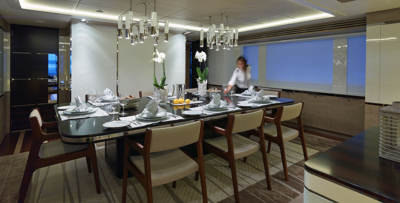 getting ready for dinner around the formal dining table Photo Credit David Churchill.jpg