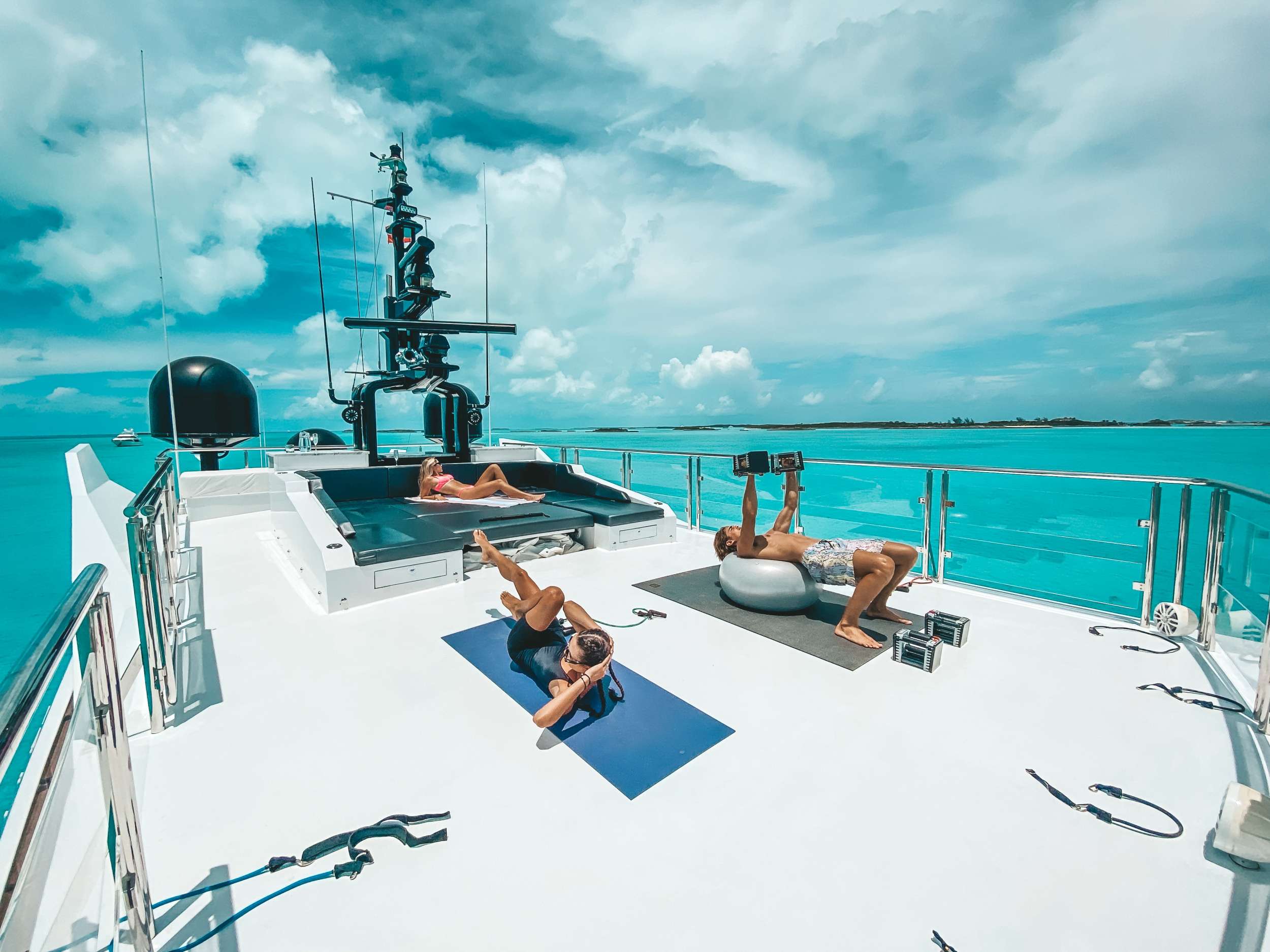 gym equipment on deck and sunbathing area.jpg