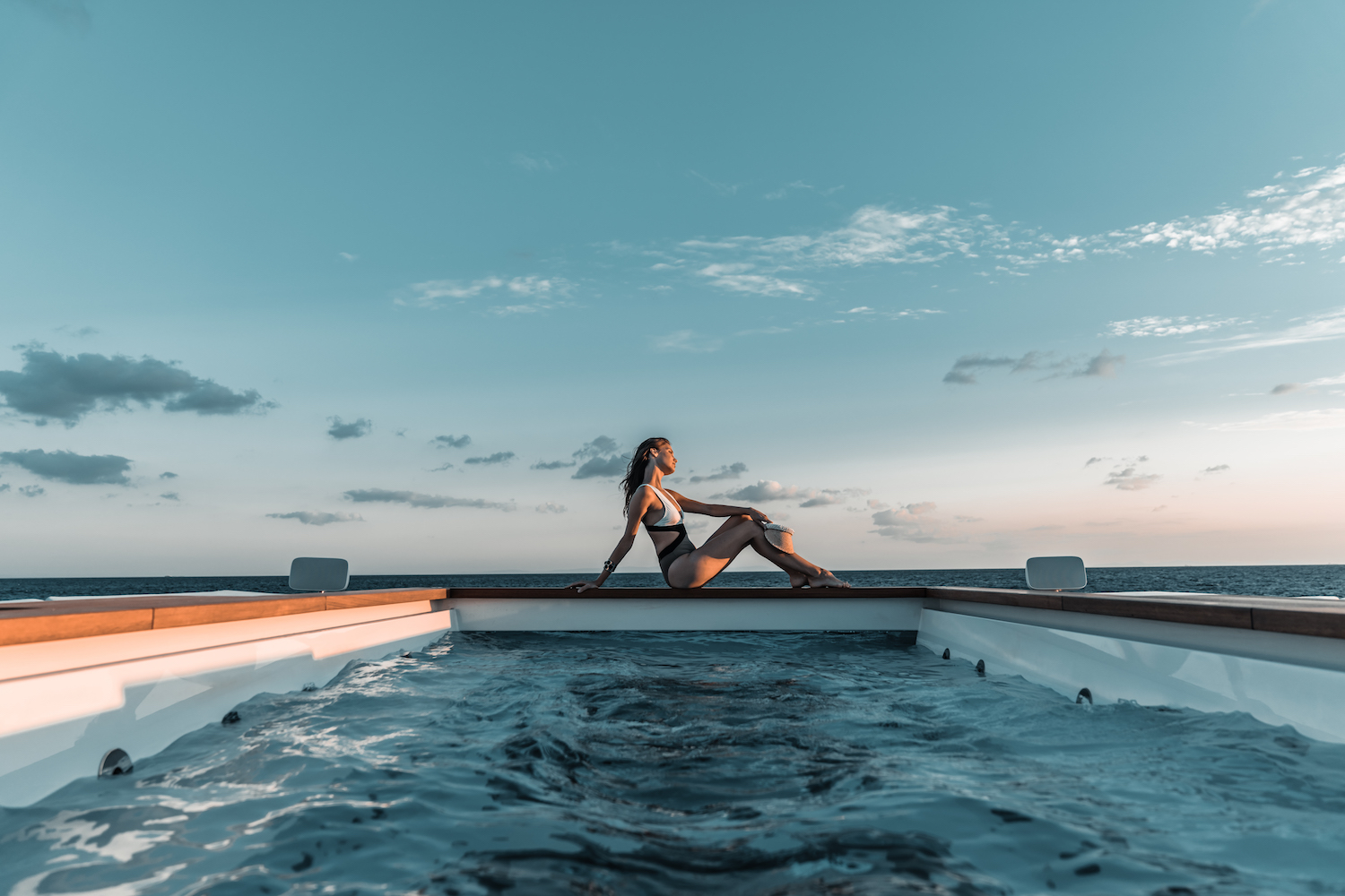 lady at the superyacht pool.jpg