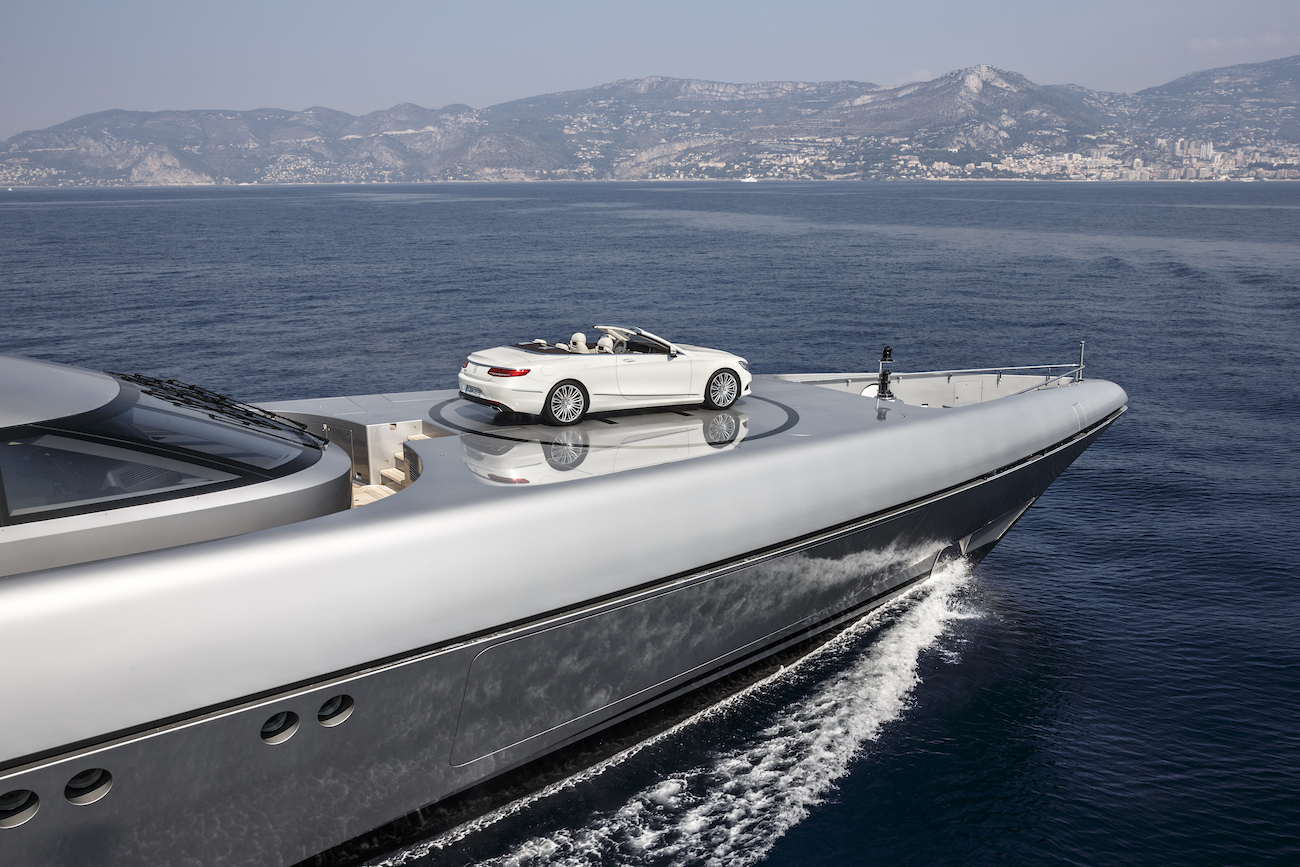 luxury yacht with Mercedes S-Class Convertible on helipad.jpg
