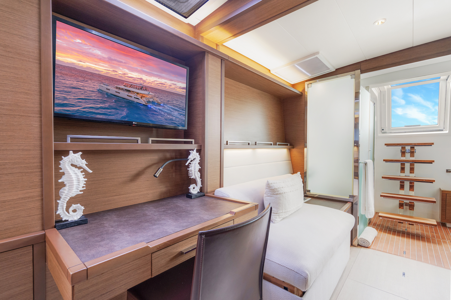 master guest cabin seating and tv.jpg