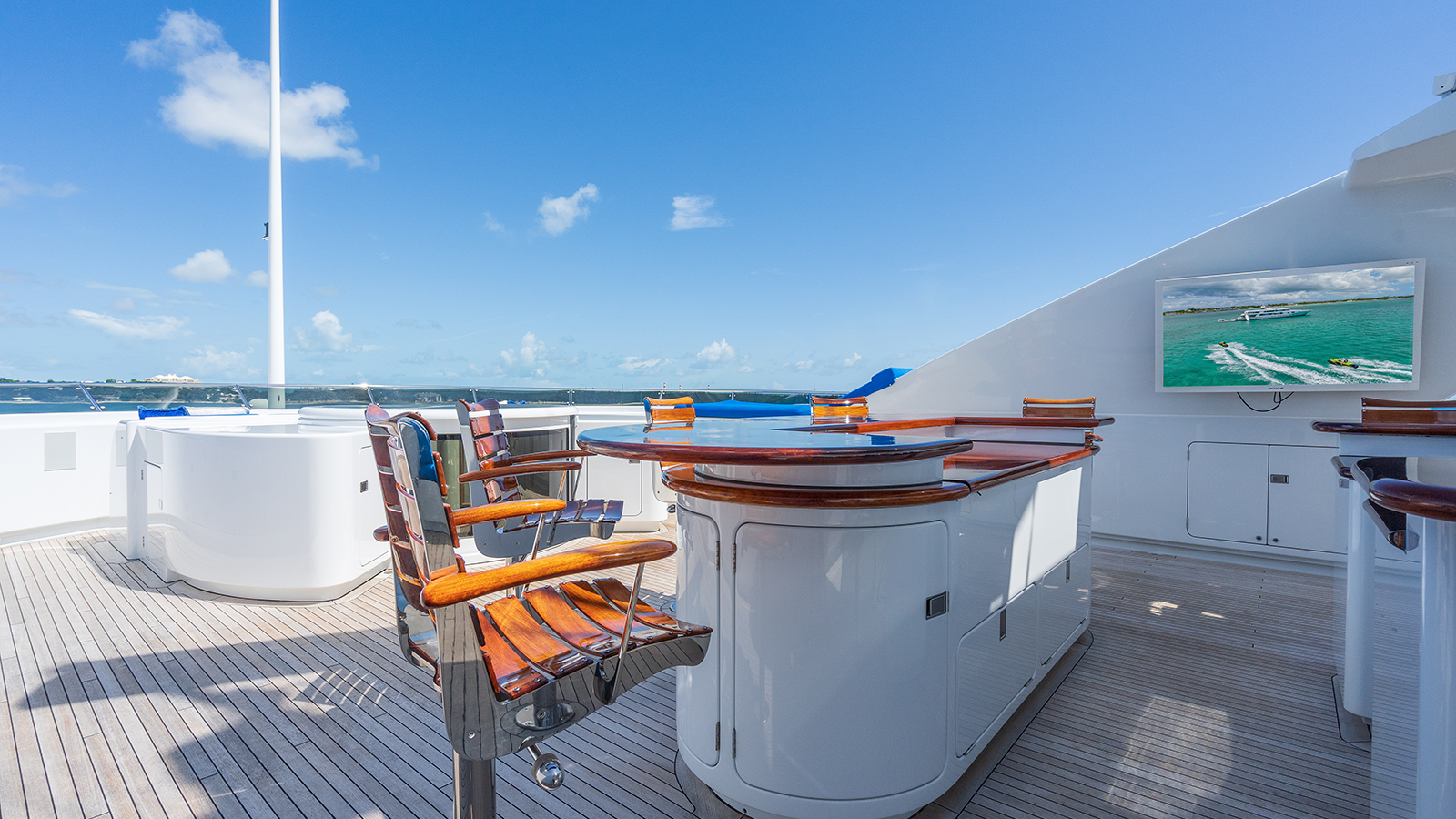 sun deck with jacuzzi bar and tv.jpg