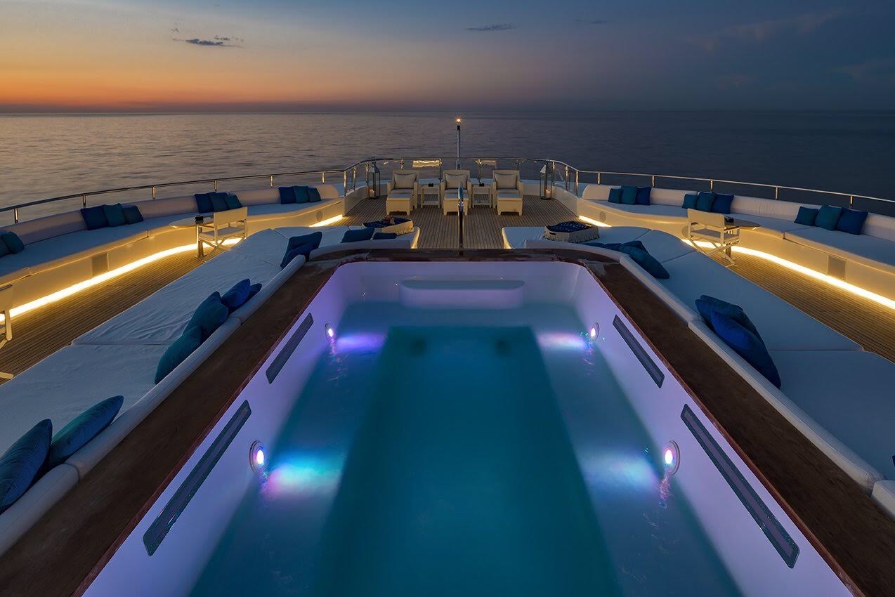 swimming pool and sun pads by night.jpg