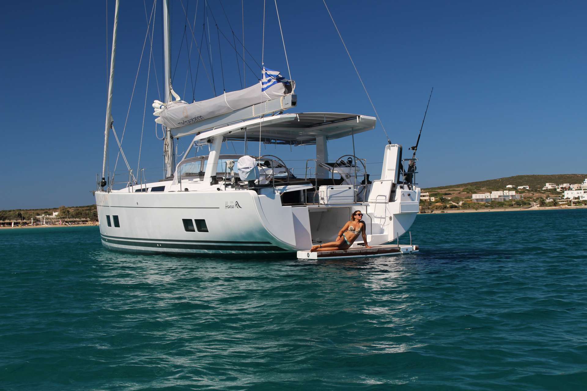 woman on sail boat swim platform.jpg