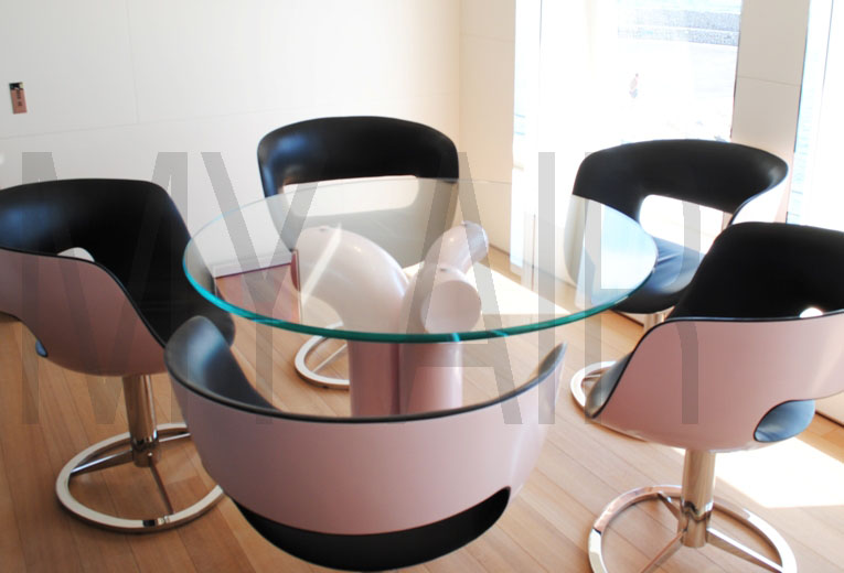 table with contemporary chairs and modern look.jpg