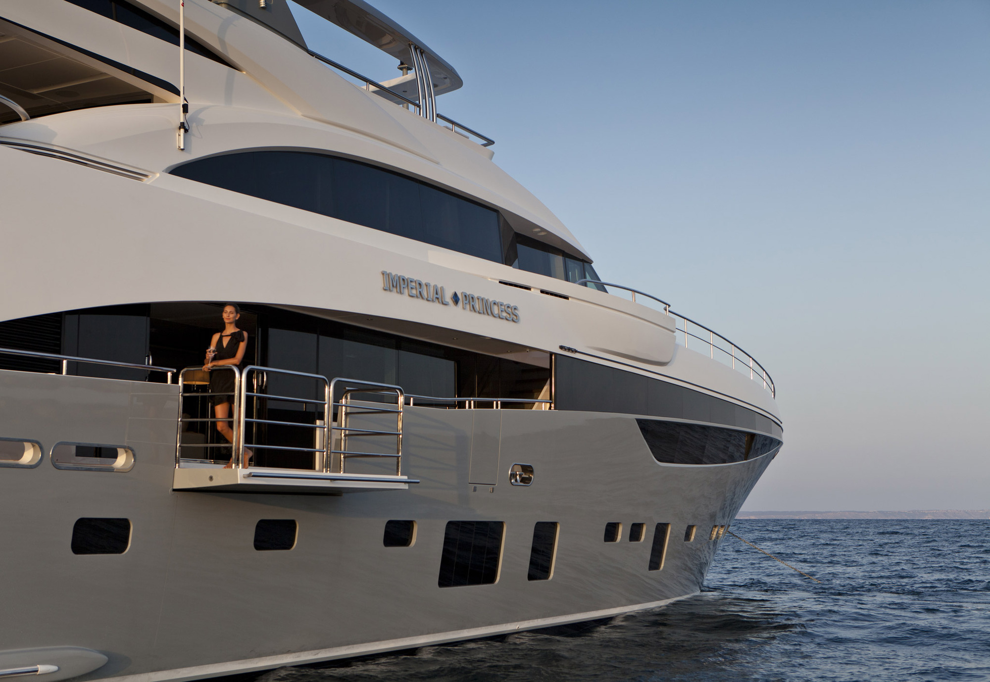 Motor Yacht IMPERIAL PRINCESS BEATRICE by Sunseeker - Side Balconey with girl.jpg