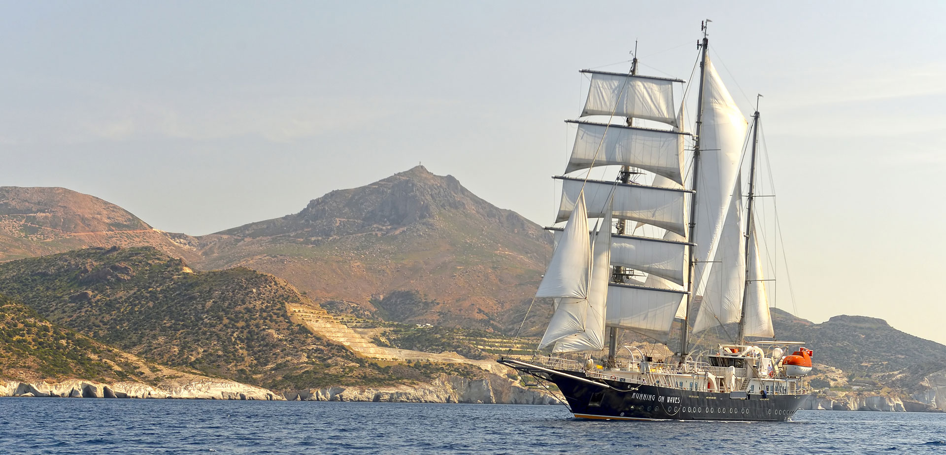 luxury yacht RUNNING ON WAVES.jpg