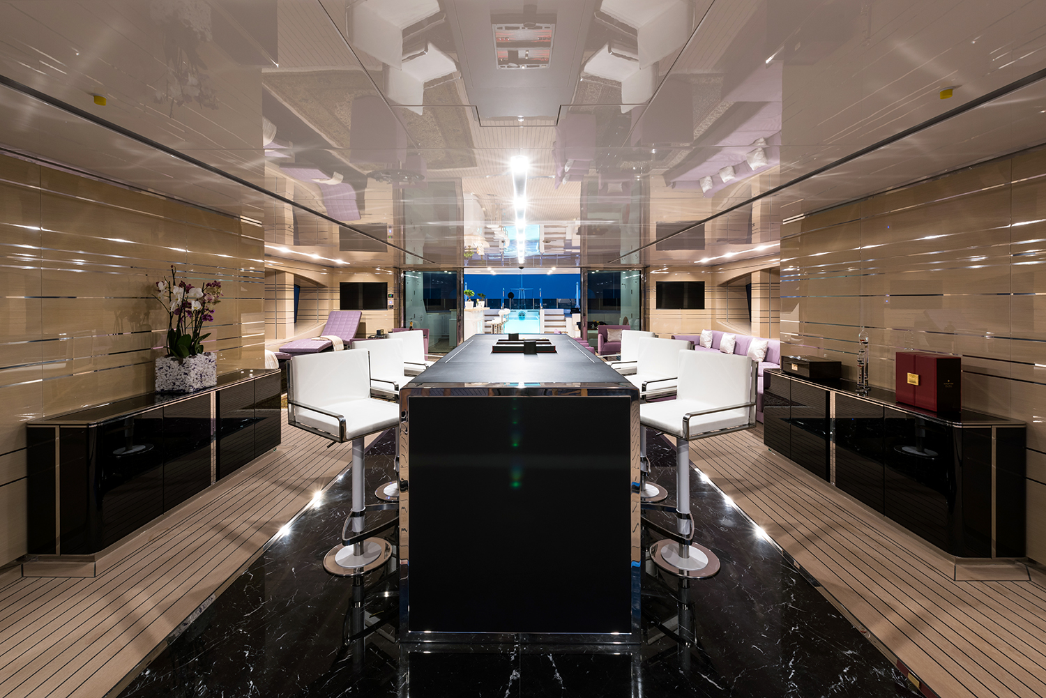 sun deck bar area with seating by night.jpg