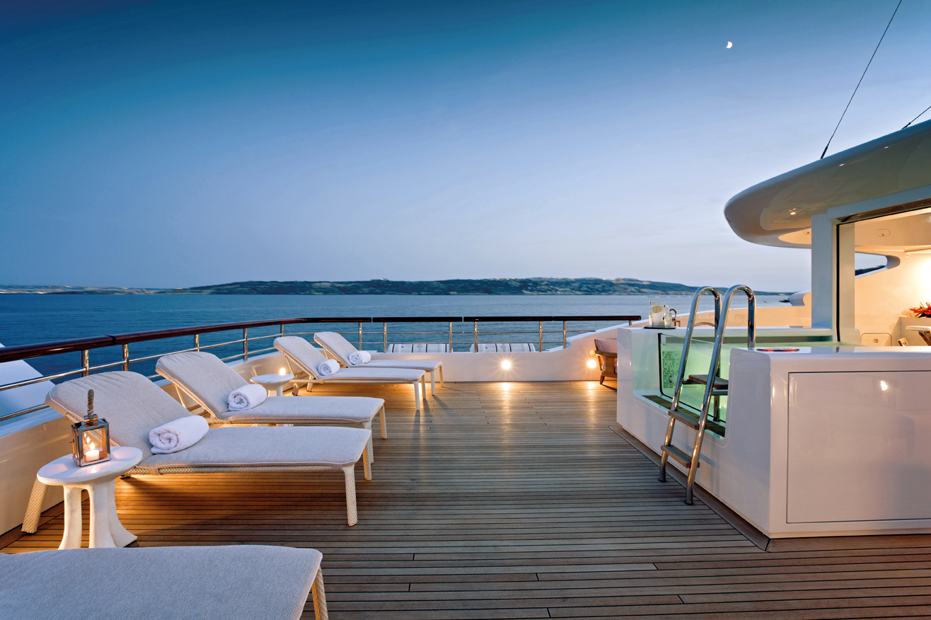 sundeck with pool and loungers.jpg