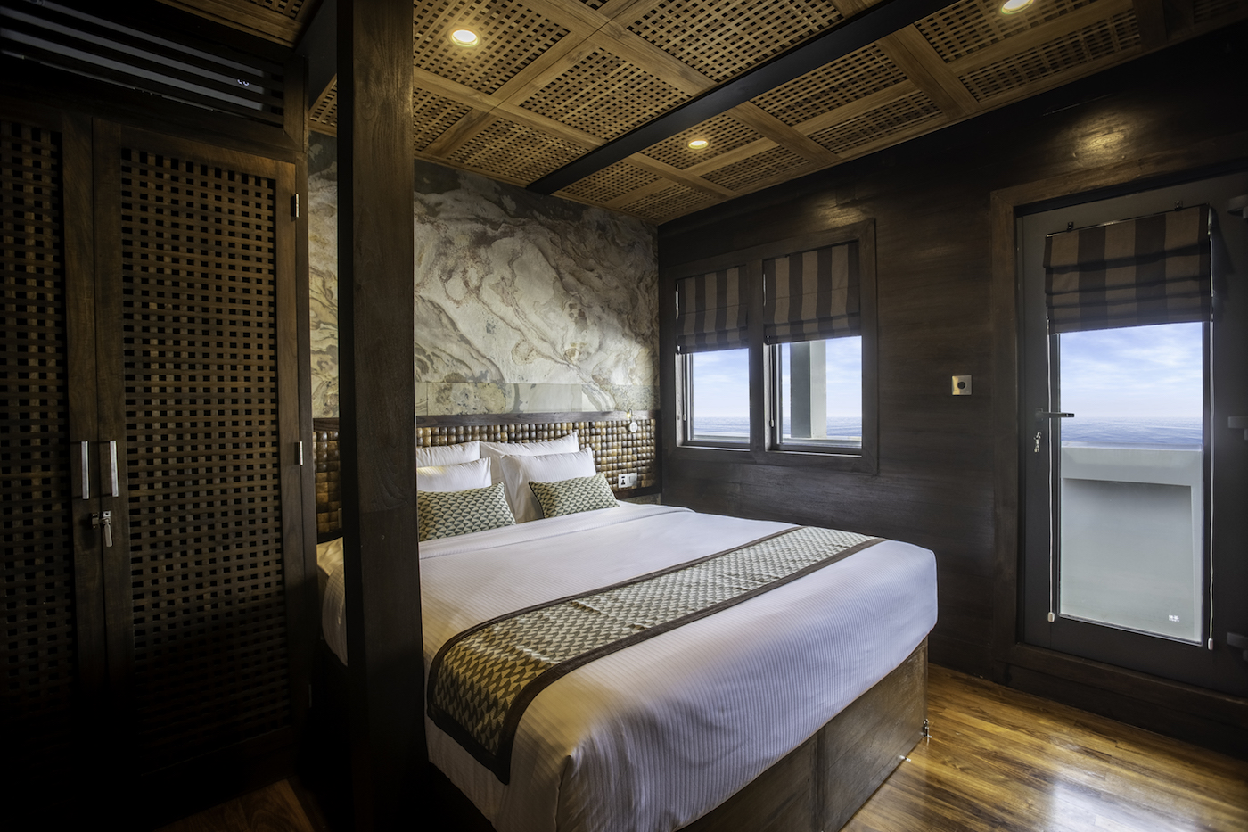 Cowrie Suite in double bed.jpg