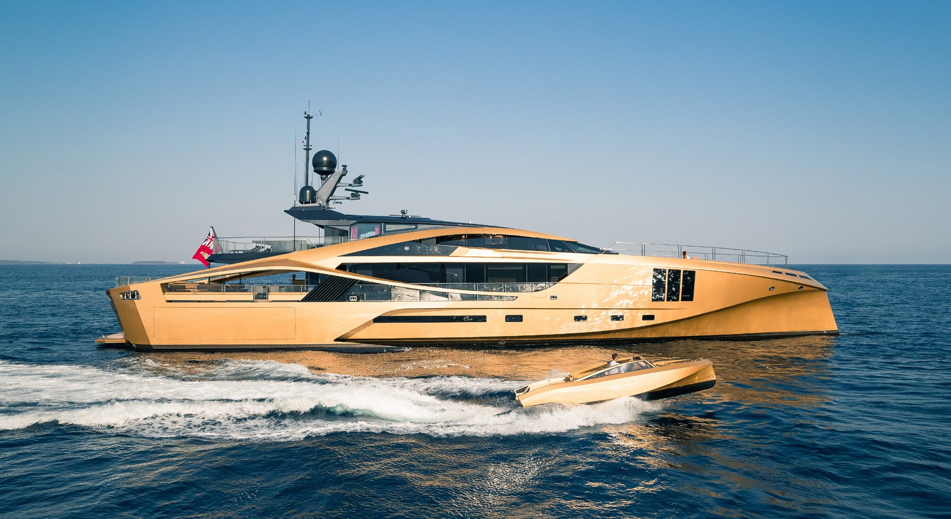 gold coloured motor yacht KHALILAH with gold tender.png