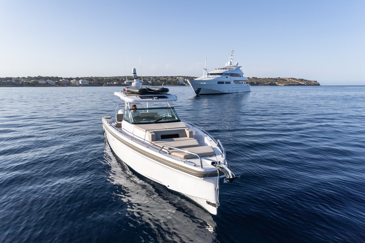 tender with yacht background.jpg