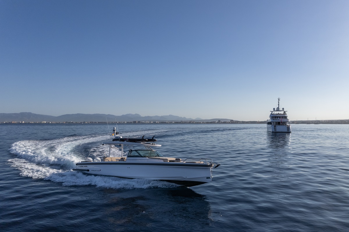 tender with yacht in background.jpg