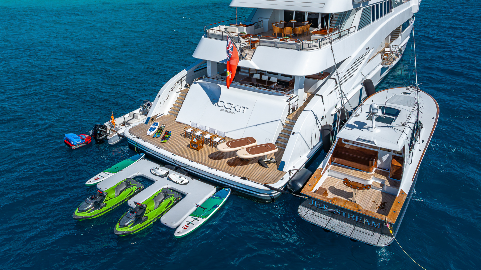 Rock It luxury yacht with fishing tender and water toys credit Yachting Image.jpg