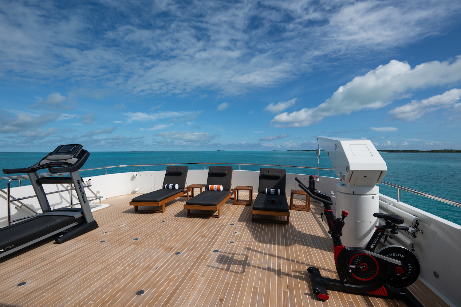 Sun Deck Chaise Lounges and Gym Equipment.jpg