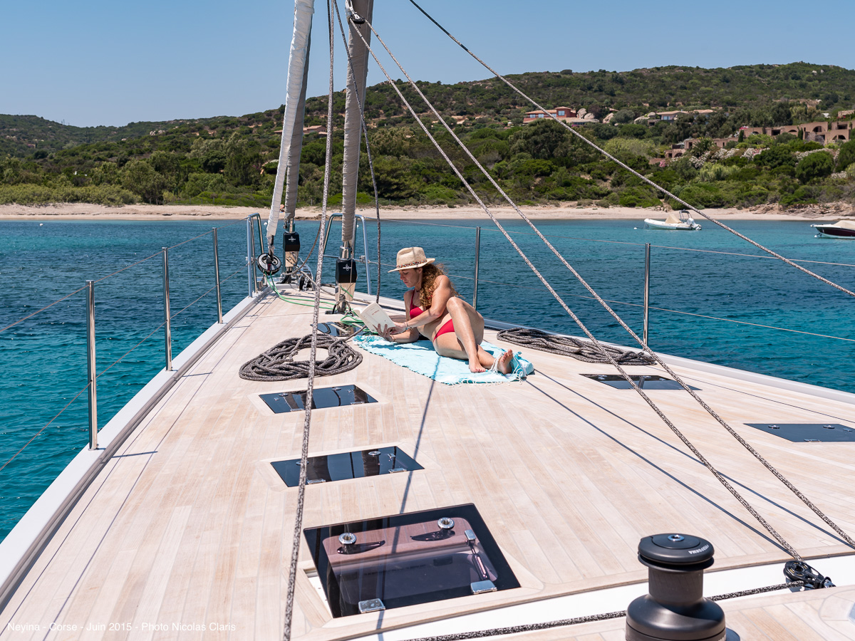 relaxing with a book on yacht.jpg