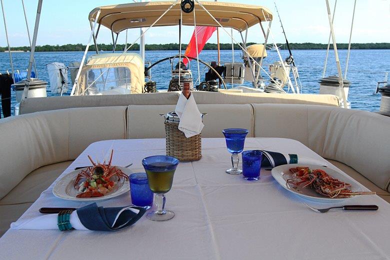 Al fresco dining aboard Aspiration yacht for charter.jpg