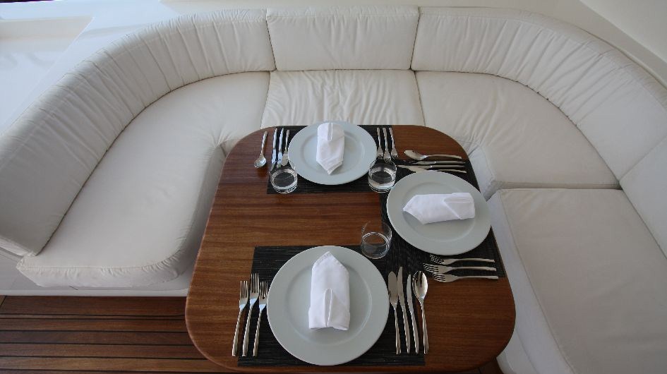 Al fresco dining on the upper deck of the MY Seven Spices - Image credit to Luxury Motor Yachts.JPG