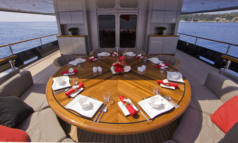 MY SILVER DREAM - Main deck alfresco table.jpg