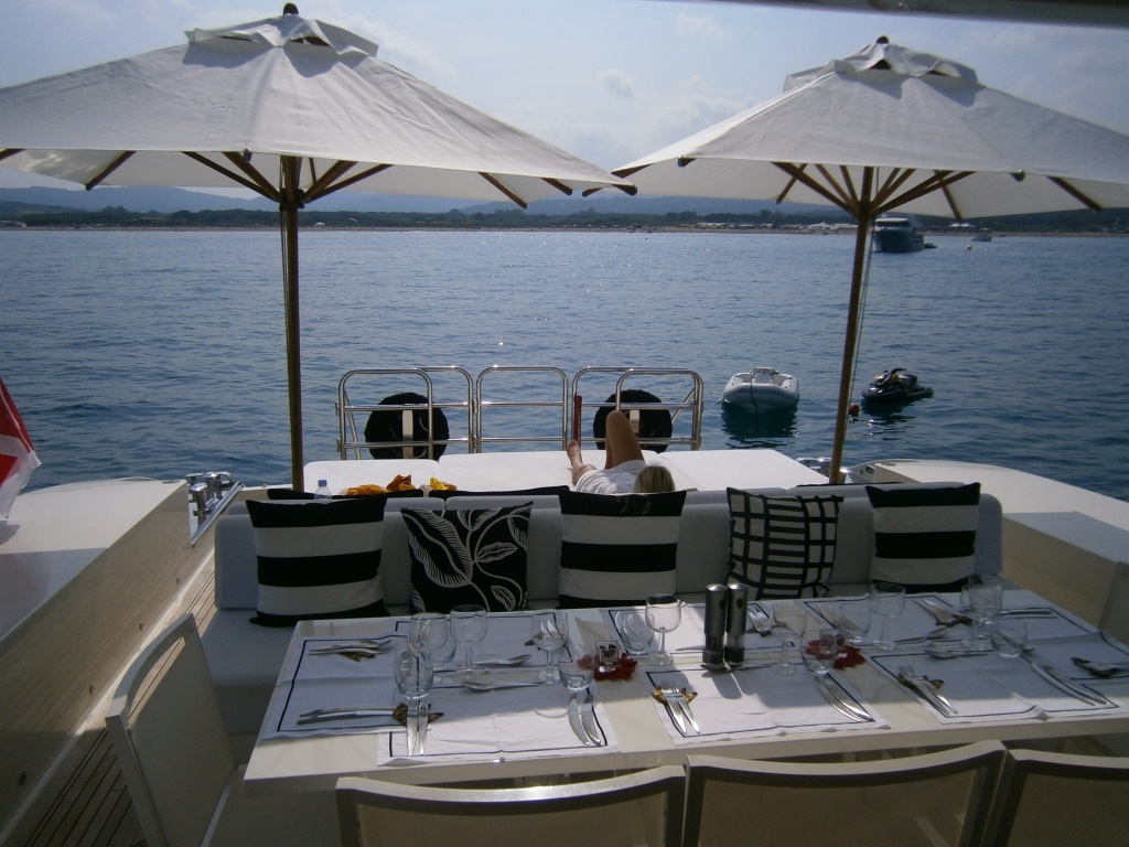 Motor yacht FRIDAY -  Aft Deck Al Fresco Dining and Sunbeds.JPG