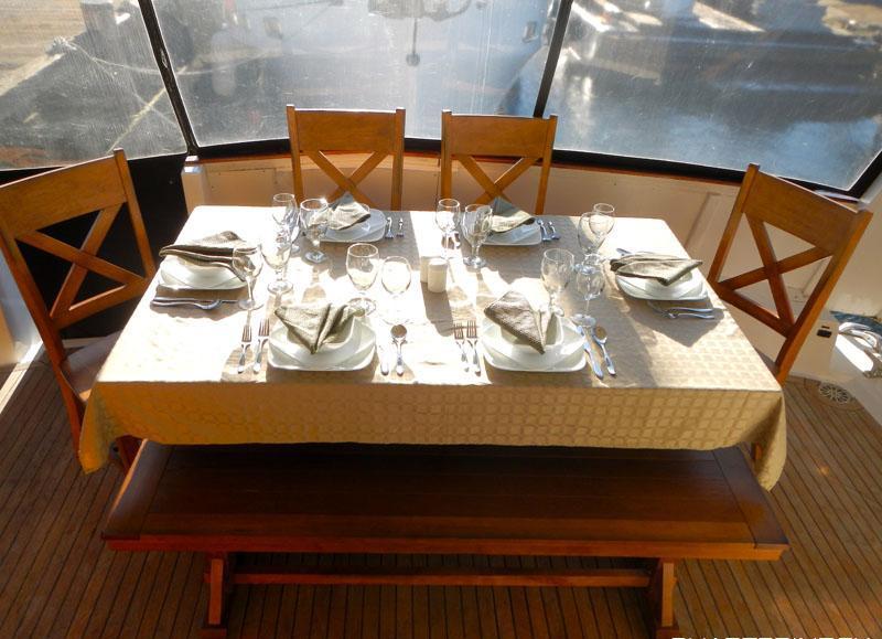 Motor yacht VIAGGIO -  Aft Deck Dining table.jpg