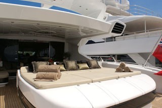 Aft Sun Bathing On Board Yacht VOYAGE