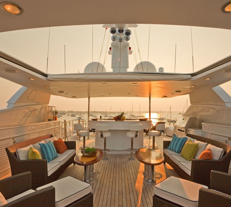 Hard Upper Retracted: Yacht COCO VIENTE's Sun Deck Sitting Photograph